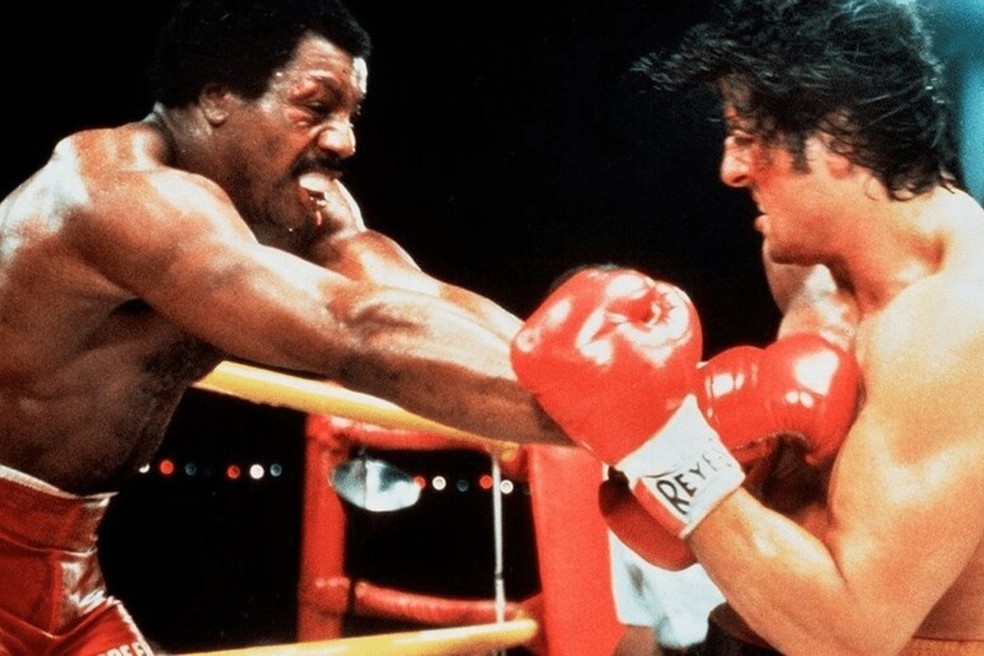 Carl Weathers e Stallone em cena de 'Rocky' — Foto: Divulgação