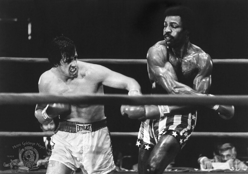 Sylvester Stallone e Carl Weathers em Rocky - Um Lutador — Foto: divulgação
