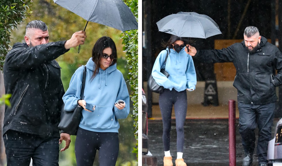 Kendall Jenner é detonada por deixar segurança protegê-la com guarda-chuva enquanto ele mesmo se molha — Foto: Getty Images