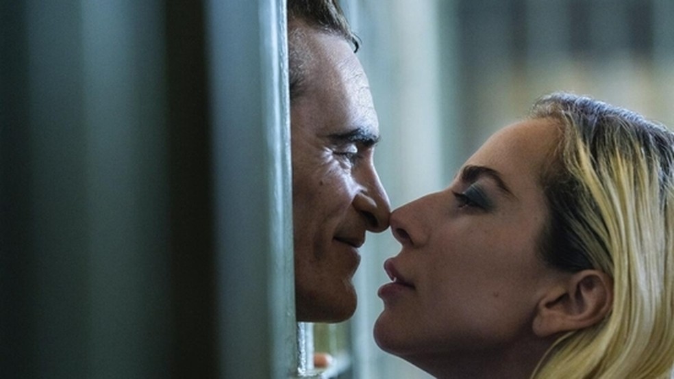 Lady Gaga e Joaquin Phoenix em cena de Coringa: Delírio a Dois (2024) — Foto: Divulgação