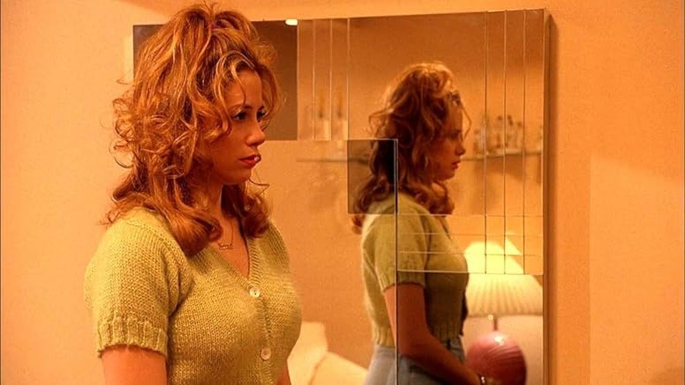 Mira Sorvino em 'Poderosa Afrodite' (1995), filme que lhe rendeu o Oscar de Melhor Atriz Coadjuvante — Foto: Reprodução