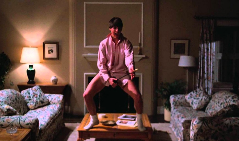 O ator Tom Cruise em cena de Negócio Arriscado (1983) — Foto: Reprodução