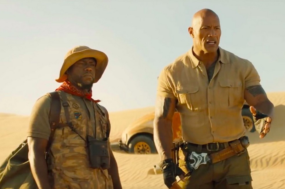 Dwayne (The Rock) Johnson e Kevin Hart em filme da franquia Jumanji — Foto: Reprodução