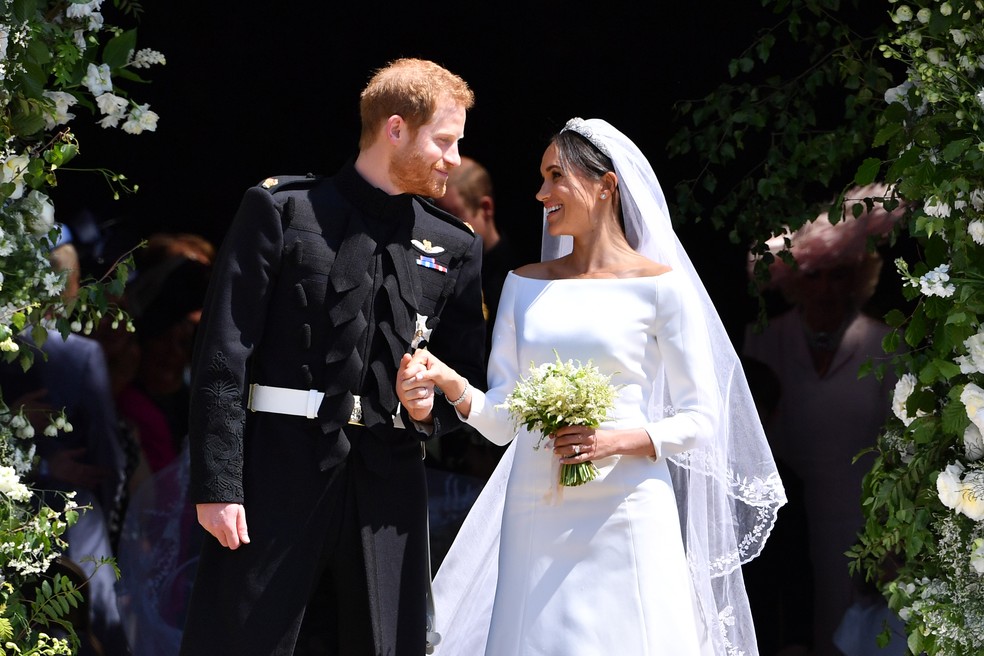 Príncipe Harry e Meghan Markle saem da Capela de Saint George, em sua cerimônia de casamento, em maio de 2018. — Foto: GettyImages