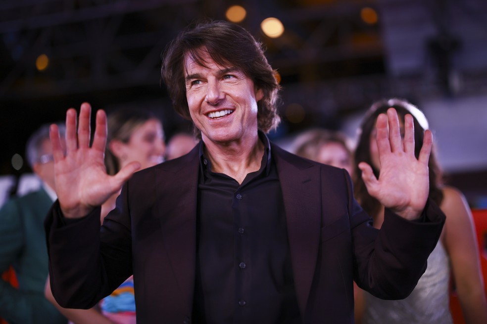 O ator Tom Cruise no evento de lançamento de Missão: Impossível - O Acerto Final (2025) — Foto: Getty Images