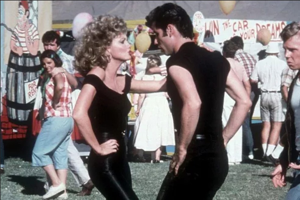 Olivia Newton-John e John Travolta na cena fimal do clássico Grease (1978) — Foto: Reprodução