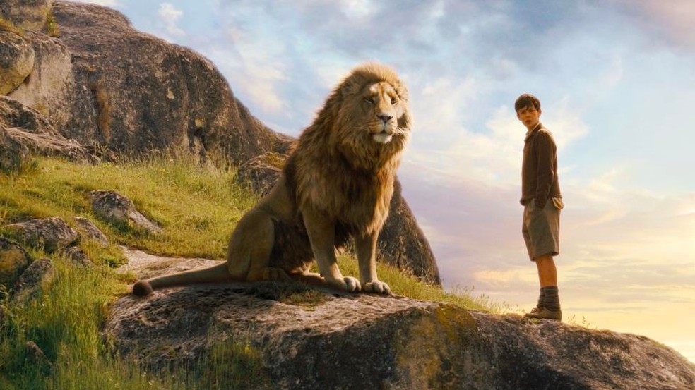 O leão Aslan, dublado por Liam Nesson nas adaptações prévias de As Crônicas de Nárnia — Foto: Reprodução