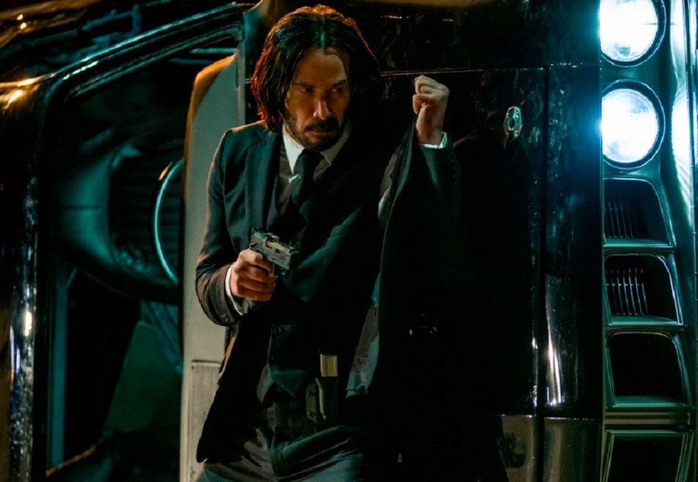 O ator Keanu Reeves em cena da franquia John Wick — Foto: Reprodução