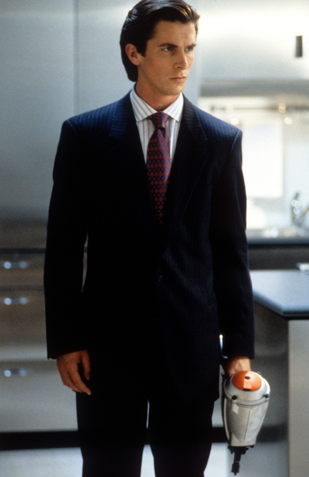 O ator Christian Bale no filme Psicopata Americano (2000) — Foto: Divulgação