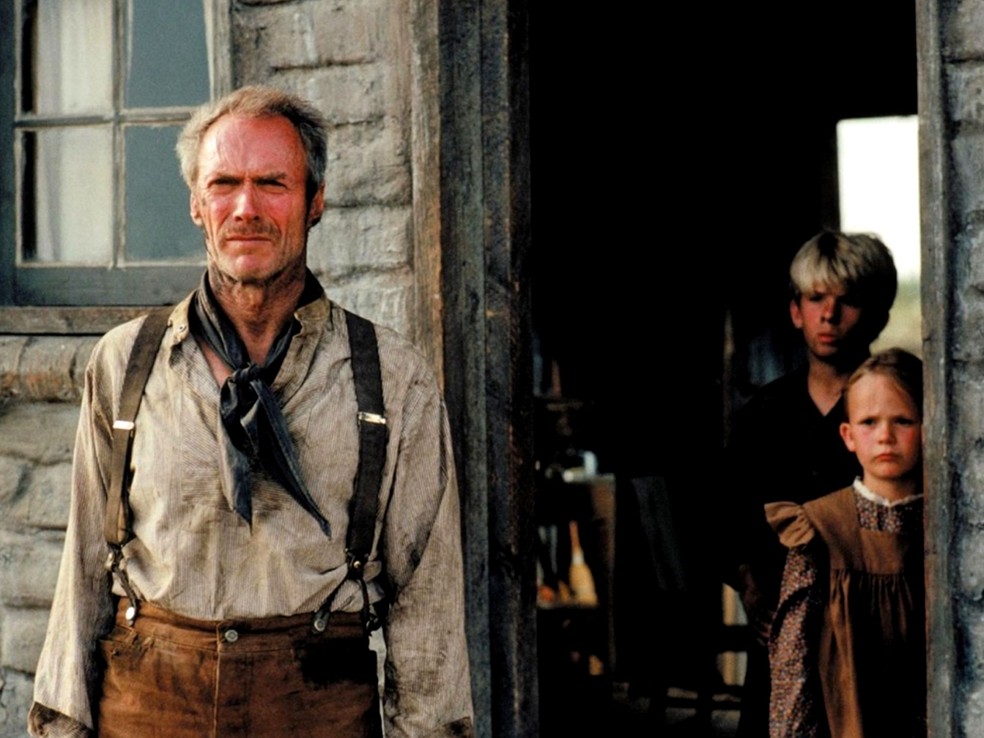 O ator Clint Eastwood no filme Os Imperdoáveis (1992) — Foto: Divulgação