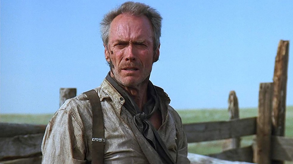 O ator Clint Eastwood no filme Os Imperdoáveis (1992) — Foto: Divulgação