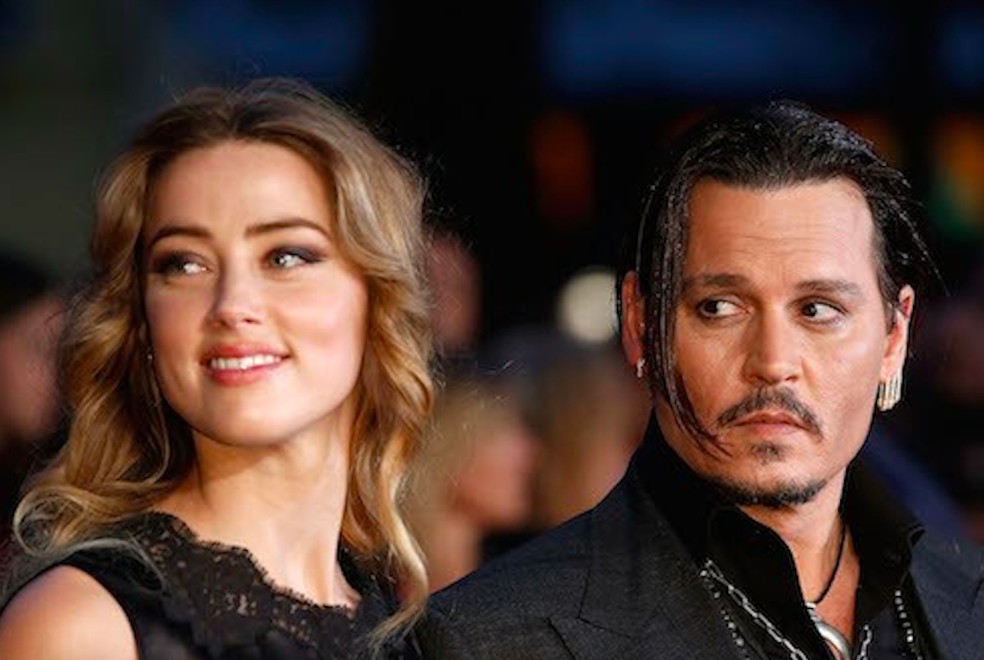 Amber Heard e Johnny Depp quando ainda eram casados — Foto: Getty Images