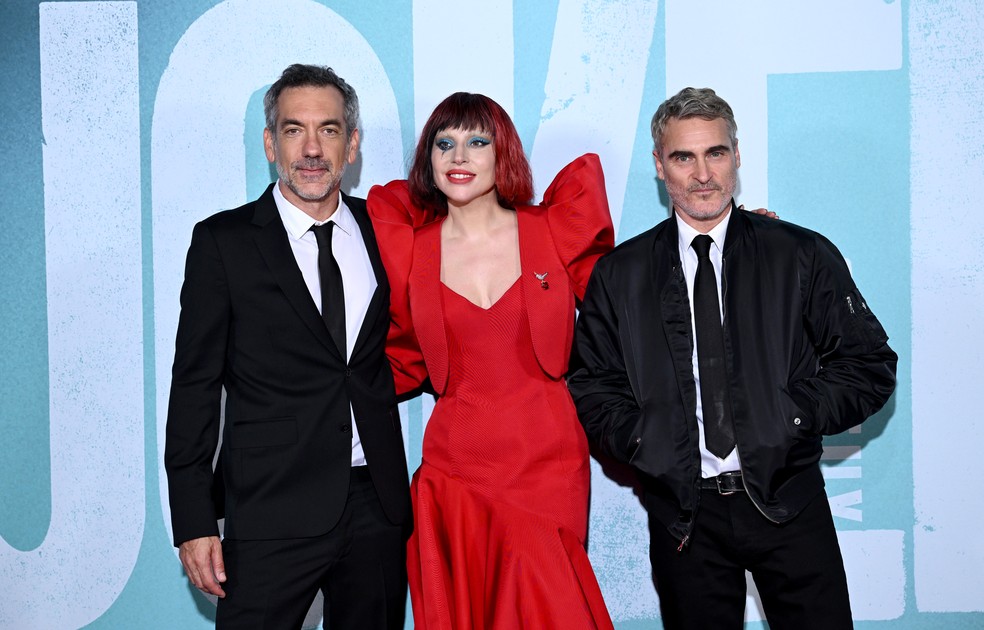 Todd Philips, Lady Gaga e Joaquin Phoenix no lançamento de  Coringa: Delírio a Dois (2024) em Londres — Foto: Getty Images