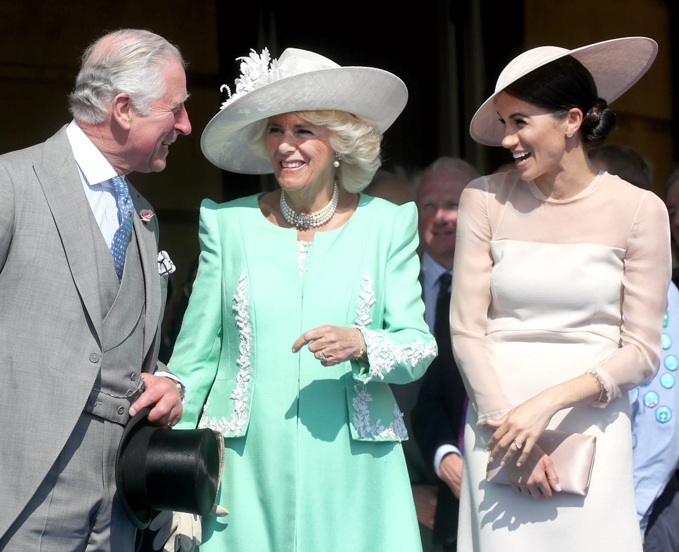 Rei Charles III, Rainha Consorte Camilla e Meghan Markle — Foto: Getty Images