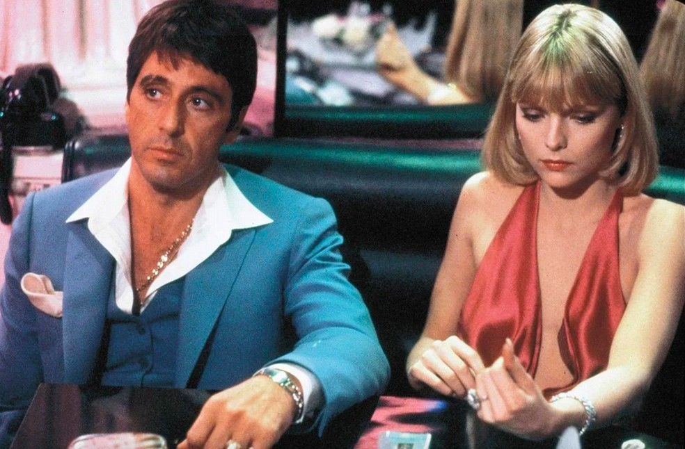 Al Pacino e Michelle Pfeiffer em Scarface (1983) — Foto: Reprodução