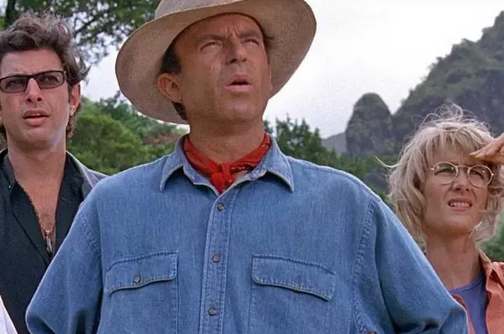 Sam Neill com Laura Dern em cena de Jurassic Park (1993) — Foto: Reprodução